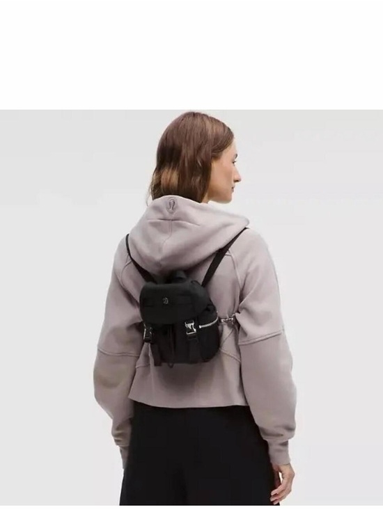 lululemon athletica Handbags - Lululemon Wunderlust Convertible Backpack Mini Black 3L Crossbody Bag NWT